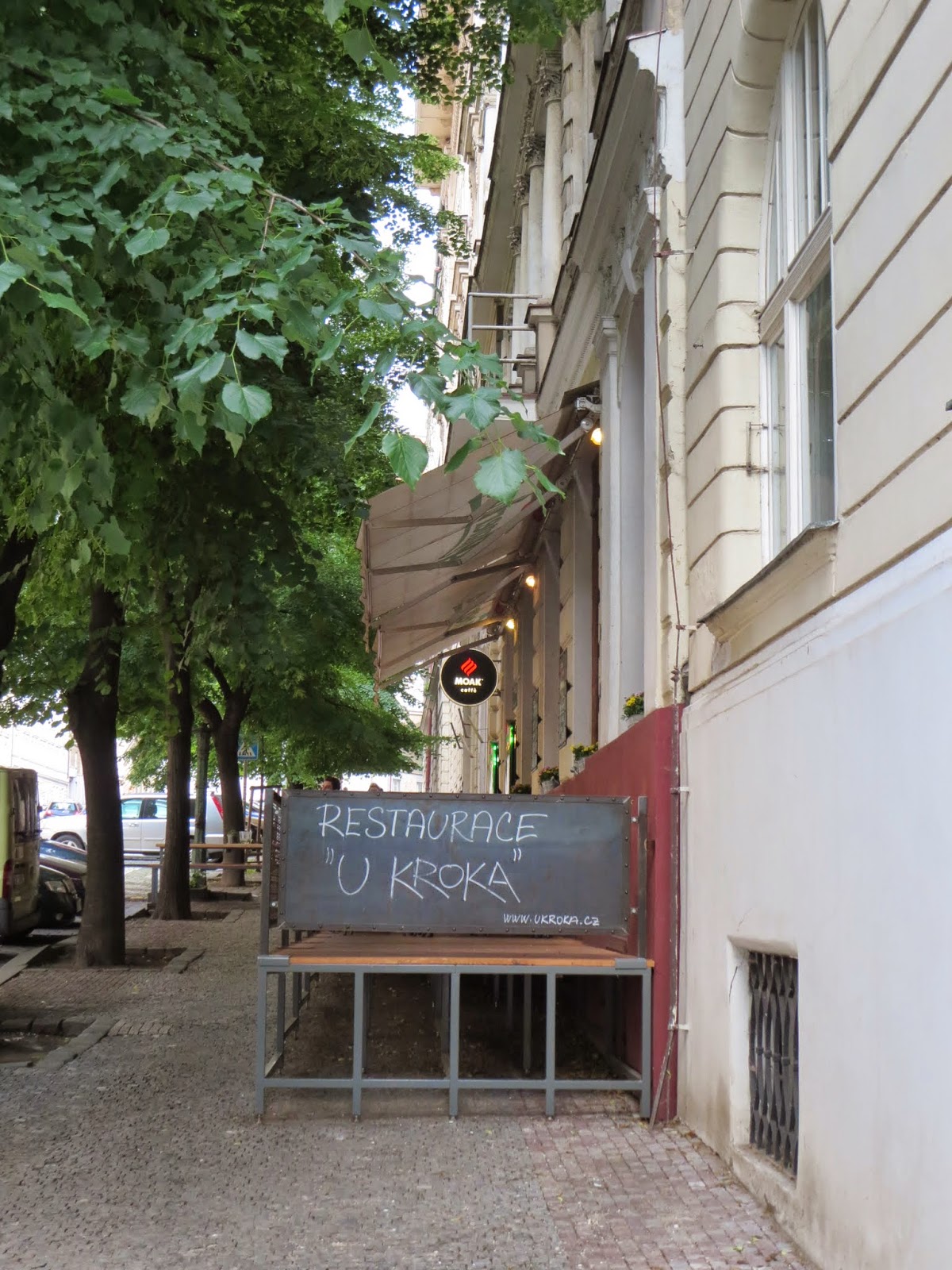 Chalkboard sign outside Restaurace U Kroka in Prague