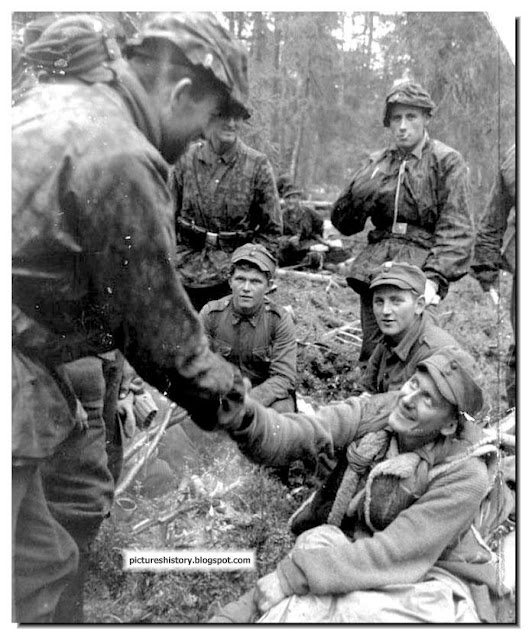 Nordland shakes hand wounded finnish soldier