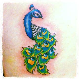 small peacock tattoos for females