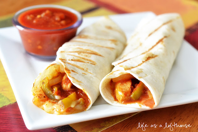 Chicken Fajita Wraps are chicken, onion and peppers marinated in a flavorful marinade wrapped with a flour tortilla. Life-in-the-Lofthouse.com