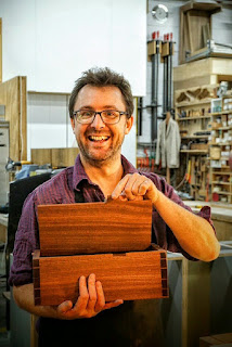 Box Making Classes at The London School of Furniture Making A happy man hold a box that he has made.
