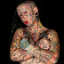 MULHER MAIS TATUADA DO MUNDO DECIDE RETIRÁ-LAS; VEJA O RESULTADO