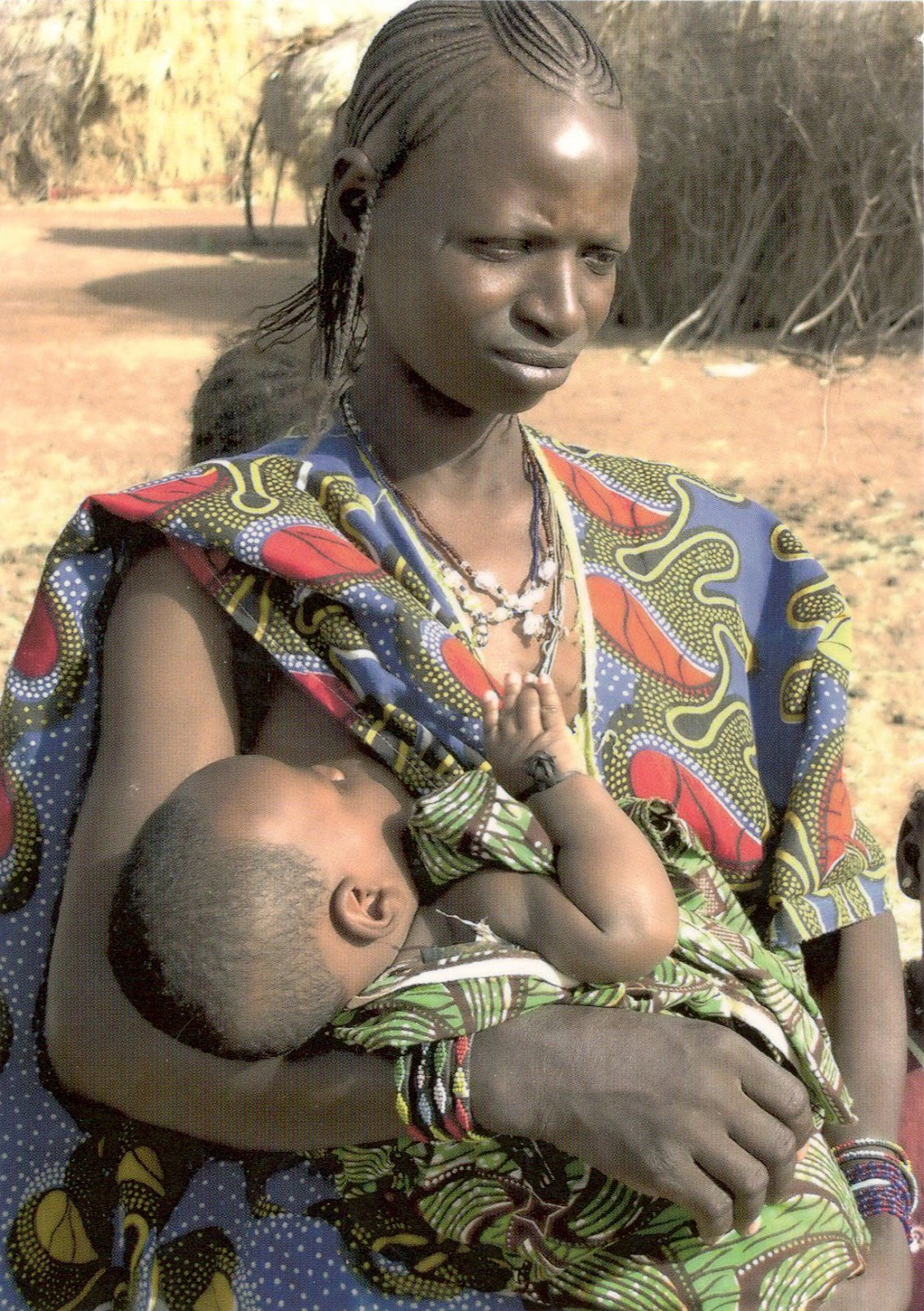 WORLD, COME TO MY HOME! 1625 GAMBIA A woman with a child WORLD, COME TO MY HOME! 1625 GAMBIA A woman with a child