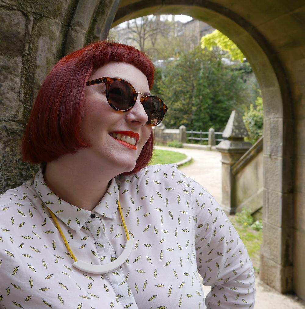 Iolla sunglasses and bright accessories Scottish blogger, red head, Scottish street style, fun street style, colourful street style, colourful blogger, colourful outfit, red bob, ginger bob, sunlglasses style, #seewithiolla, iolla, Beth lamont necklace, yellow accessories, lightning bolt shirt, patterned shirt, denim jacket, yellow nails, Scottish summer, Murray sunglasses, tortoise shell sunglasses