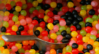 Snoepgoed achtergrond met Jellybeans in alle kleuren