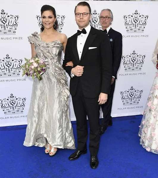 King Carl Gustaf, Queen Silvia, Crown Princess Victoria, Prince Daniel, Princess Madeleine, Prince Carl Philip and Princess Christina, Mrs. Magnuson