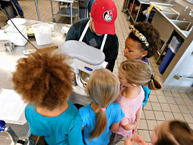 Making frosting with Girl Scouts of North East Ohio