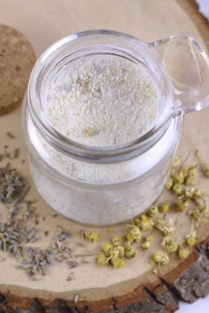 This lavender chamomile diy milk bath is great for dry skin.  It has bath ingredients to soothe irritated and dry skin.  This milk bath diy is easy to make.  Milk baths are great for dry skin.  Learn how to milk bath with this easy recipe.  Homemade milk bath with just a few ingredients.  This milk bath recipe has dried chamomile and dried lavender.  #mlkbath #lavender #chamomile #dryskin #diybeauty #diy #herbal #herbalbeauty