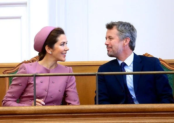 Queen Margrethe, Crown Prince Frederik and Princess Benedikte. Crown Princess Mary wore Claes Iversen coat