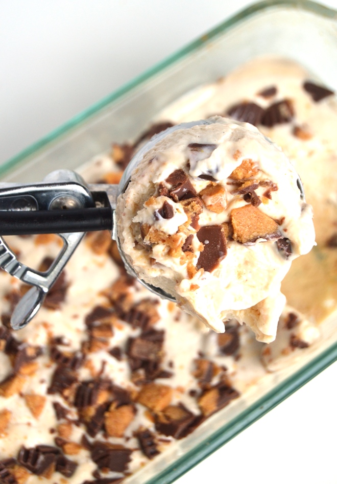 Peanut Butter Cup Frozen Yogurt is a healthier treat with only 3 ingredients, is packed full of protein with Greek yogurt and tastes like an indulgent dessert with chunks of creamy peanut butter cups and the creamiest ice cream base! www.nutritionistreviews.com