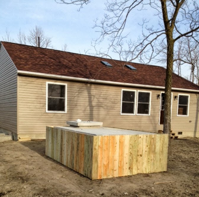 Our House Kelleys Island Water tank wood fixed