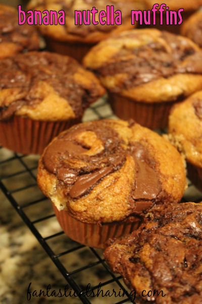 Banana Nutella Muffins // Sweet banana muffins with a rich swirl of Nutella #recipe #muffins #breakfast #Nutella