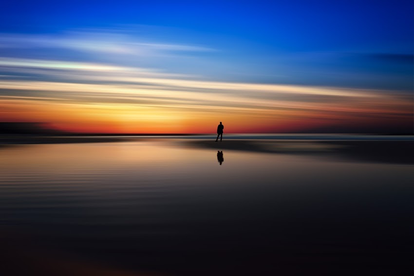 Silhouette of Man on Water Silhouette of Man on Water
