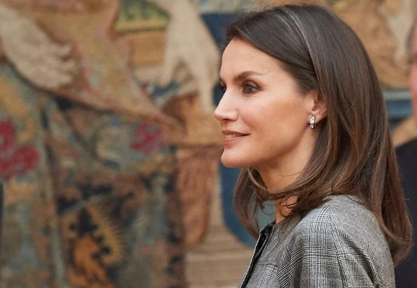 Queen Letizia wore Massimo Dutti wool check belted dress