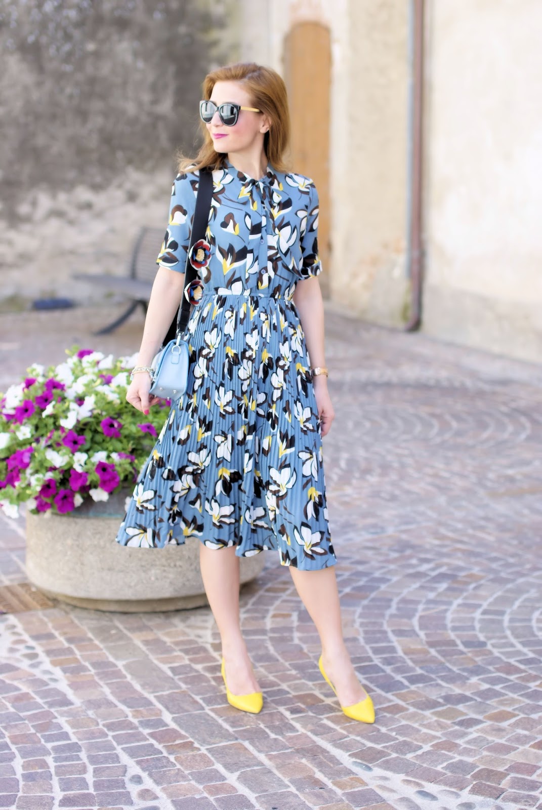 Modest outfit idea with a floral pleated midi dress from Metisu on Fashion and Cookies fashion blog, fashion blogger style