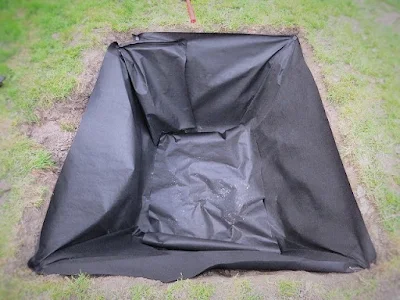 landscape cloth dry well liner hole dirt water drainage