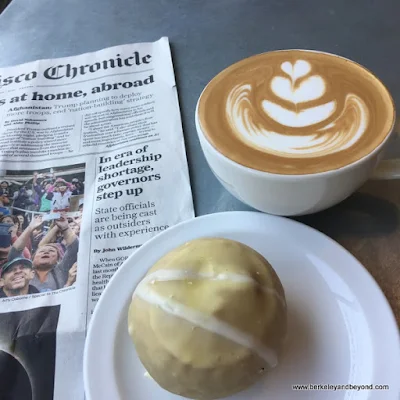 creamsicle vegan donut and cappuccino at Coffee Conscious in Berkeley, California