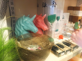 unicorn candles on shelf