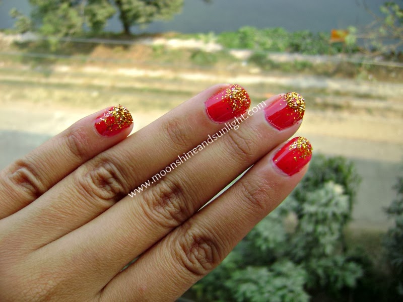 Day 7 Red and golden glitter nail art 