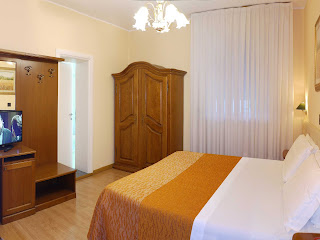 The rooms at the Victoria are furnished in classical Italian style