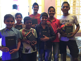 Children from the Northern State of Bihar receiving a Hindi Bible