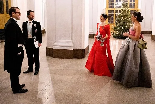 Queen Silvia, Prince Daniel, Prince Carl Philip. Princess Sofia wore a red dress. Crown Princess Victoria wore her mother's gown