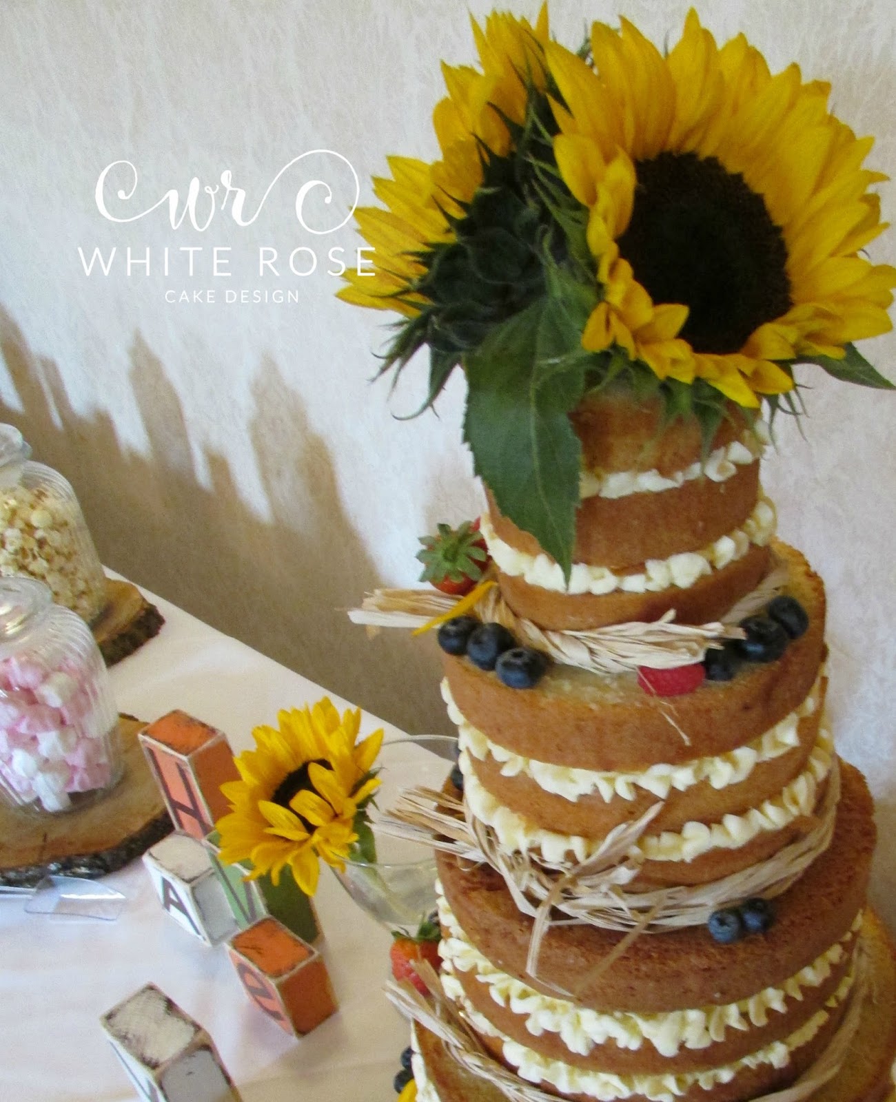 Five Tier Naked Cake With Sunflowers White Rose Cake Design
