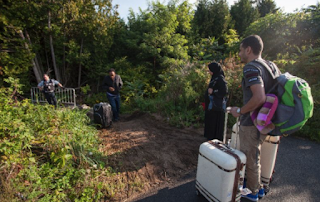 Canada preparing winter shelters as migrant wave continues