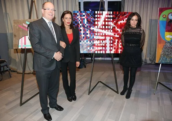 Princess Stephanie, Prince Albert, Camille Gottlieb and Louis Ducruet. Stephanie wore Chanel pantsuit and red top