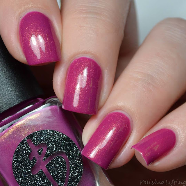 berry creme with gold shimmer nail polish