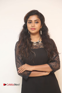 Actress Karunya Stills in Black Long Dress at Dharma Yogi Audio Launch  0029