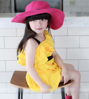 Girl in Twinkling Yellow Off Shoulder Dress