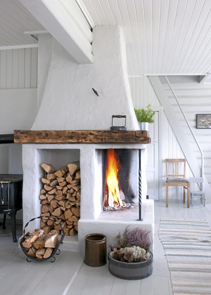 Icono Interiorismo: Como almacenar la leña de la chimenea dentro de casa