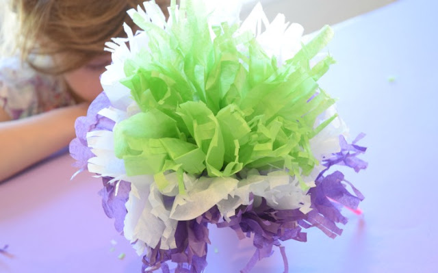 Tissue Paper Flowers- Classic Kids Craft.  Perfect spring or summer project for preschoolers, kindergartners, or elementary children.  Make a whole colorful flower bouquet!