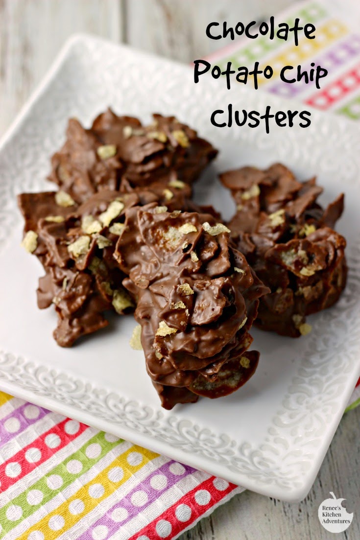 Chocolate Potato Chip Clusters on a white serving platter