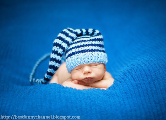 Baby in blue hat