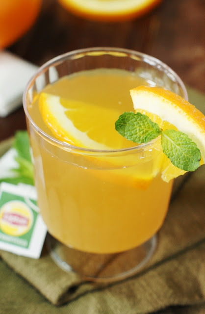 Orange-Green Tea Punch ~ Green tea and fresh orange juice beautifully combine to create one very tasty tea-based punch!   www.thekitchenismyplayground.com