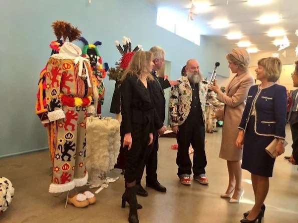 Queen Mathilde of Belgium and Daniela Schadt, partner of German President meet students of the Antwerp Fashion Academy during a visit to the MoMu fashion museum