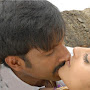 Actress Anushka Hot Lip Lock With Gopichand Photos