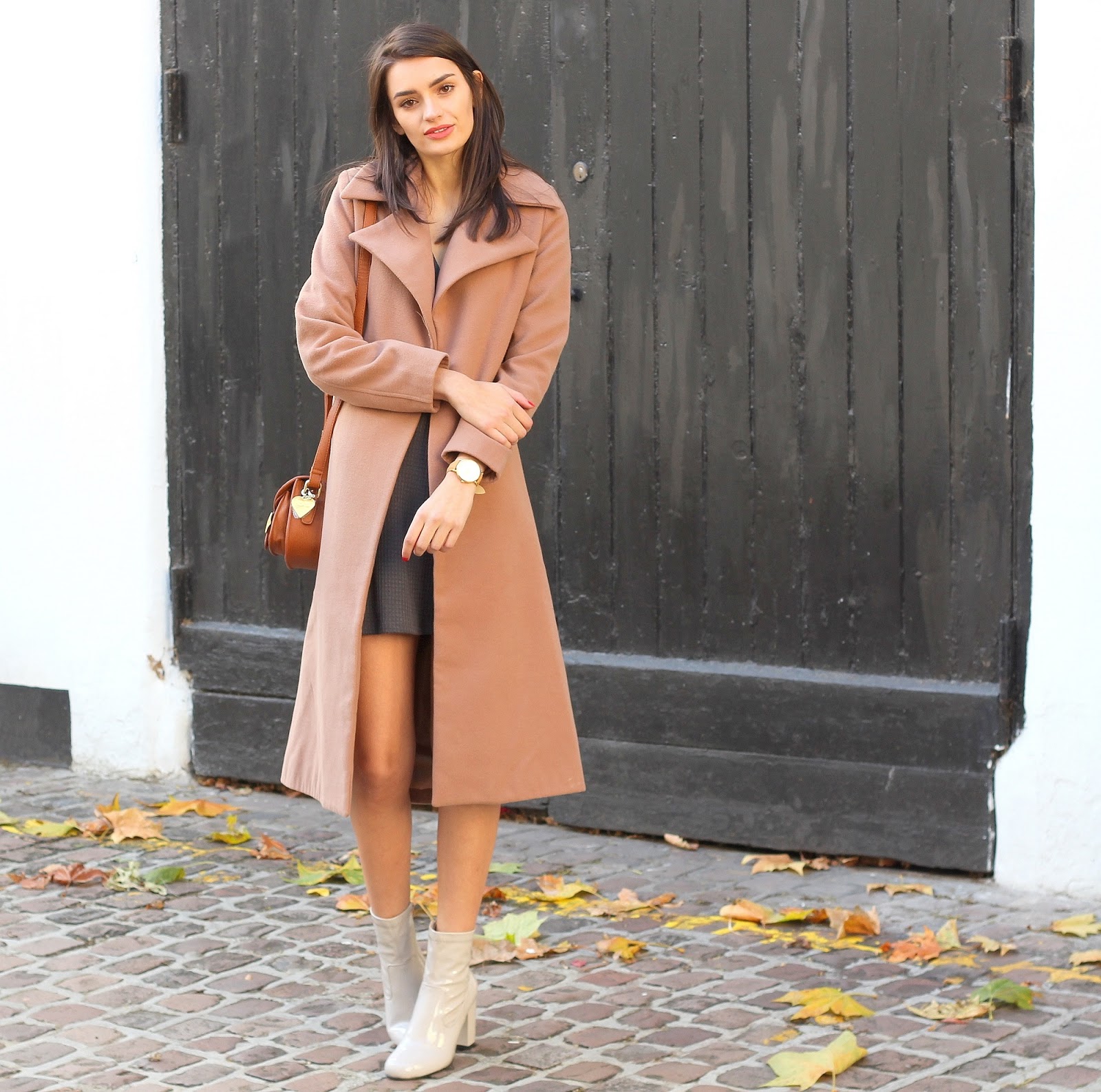peexo fashion blogger wearing camel coat and patent grey boots