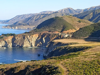 A bay and rolling hills in America