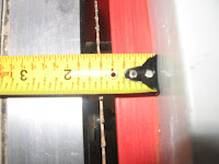 Set table saw to 1 1/4 inches.  Depth is 1/8 of an inch