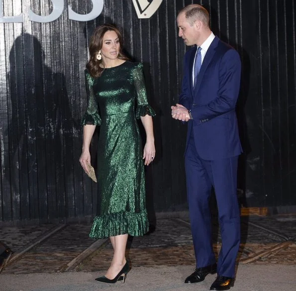 Kate Middleton wore The Vampire's Wife Falconetti emerald midi dress, Brora gold charm earrings. Meghan Markle