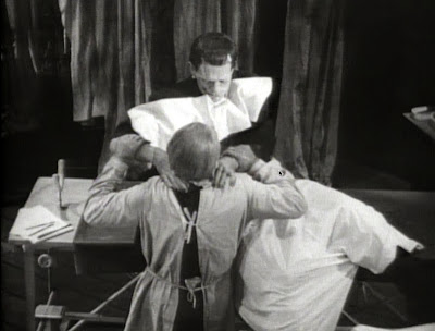 Boris Karloff and Edward Van Sloane in Frankenstein (1931)