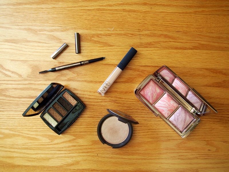 open makeup product flatlay