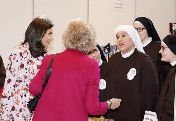 Queen Letizia wore a new floral print midi shirtdress by Hugo Boss at charity market Rastrillo Nuevo Futuro. Queen Sofia