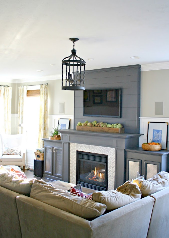 Dark gray fireplace with built ins
