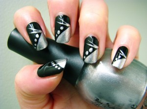   Black and Metallic Silver Dotted and Striped Nail Art