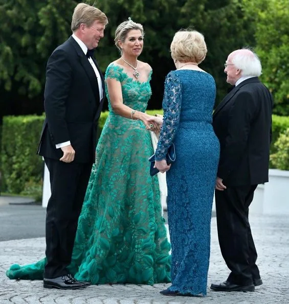 Queen Maxima wore a green lace gown by Jan Taminiau. Lace dress by Dutch designer Jan Taminiau. Green diamond earrings, tiara, necklace