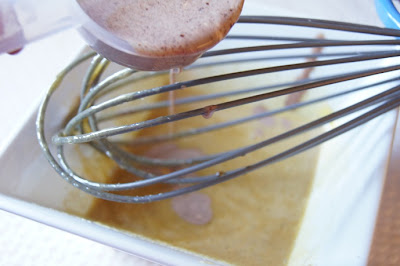 Pour hot liquid slowly into eggs while whisking